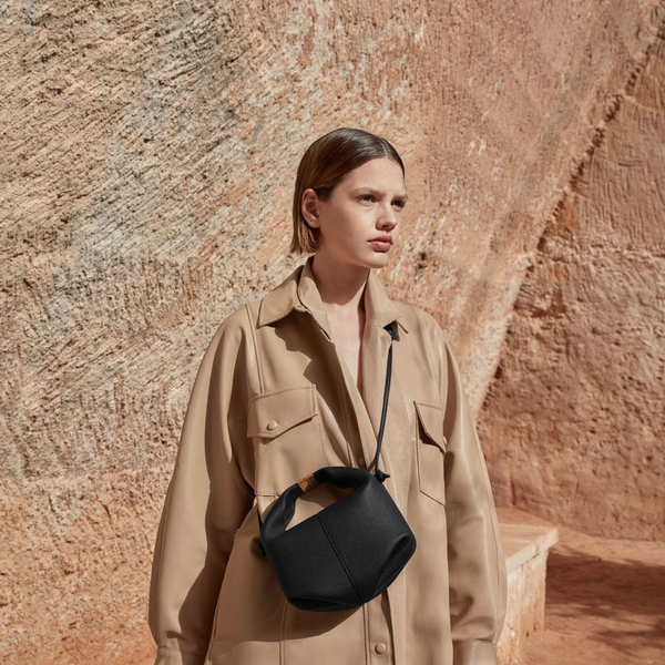 Sleek Black Crossbody Mini Bag with Modern Geometric Shape